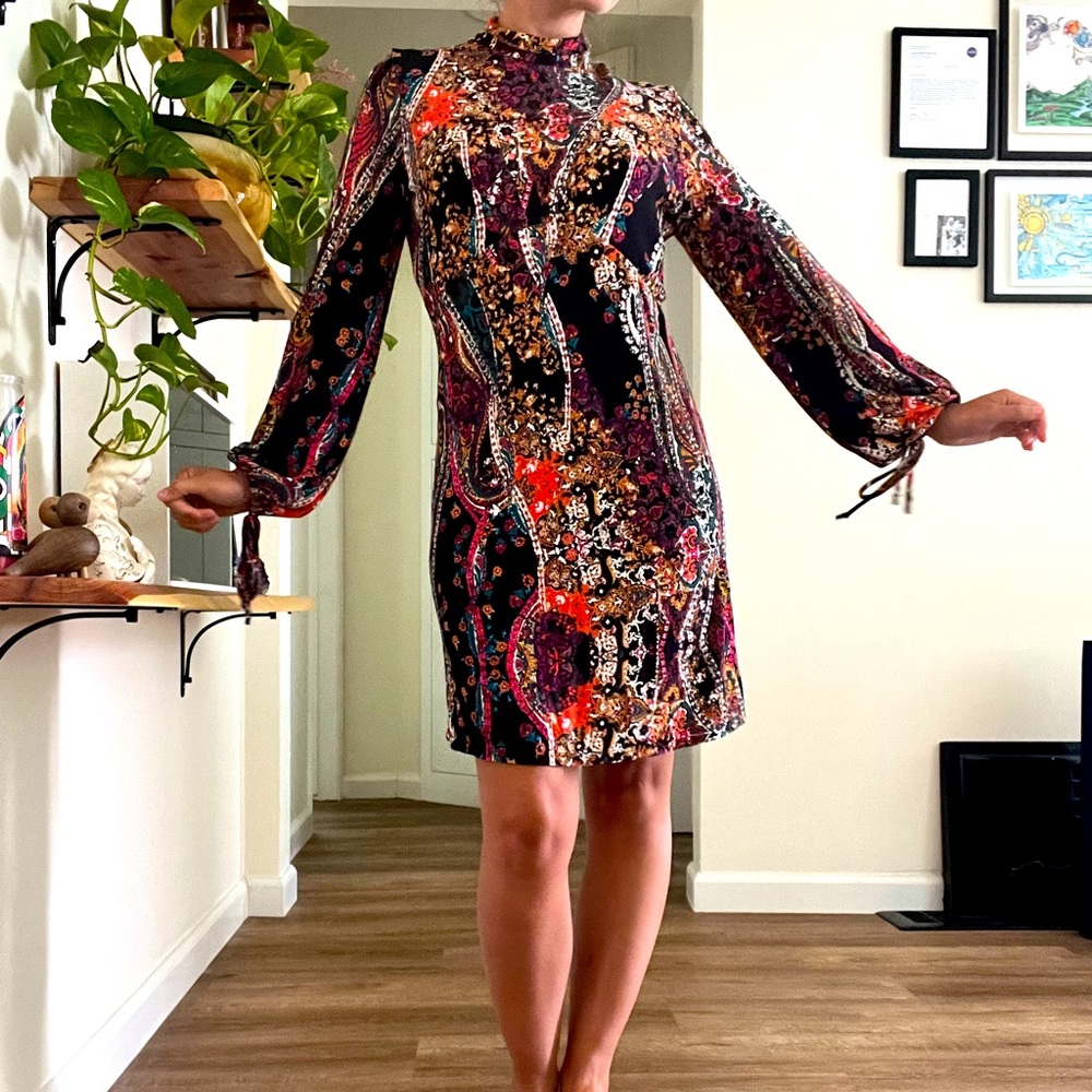 Funky flattering backless Free people Dress!